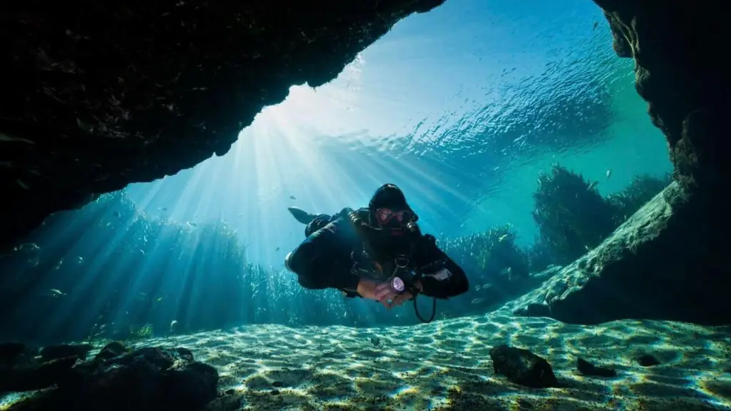 Diver in underwater cave