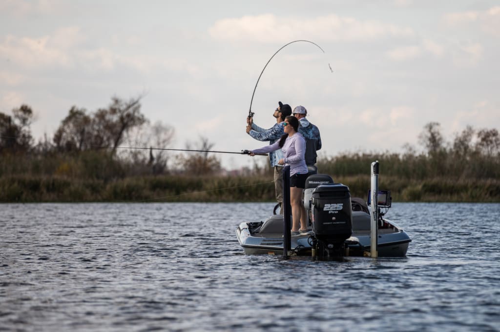 Fishing on Lake Seminole, Throwing their reels out for the first cast of the day.