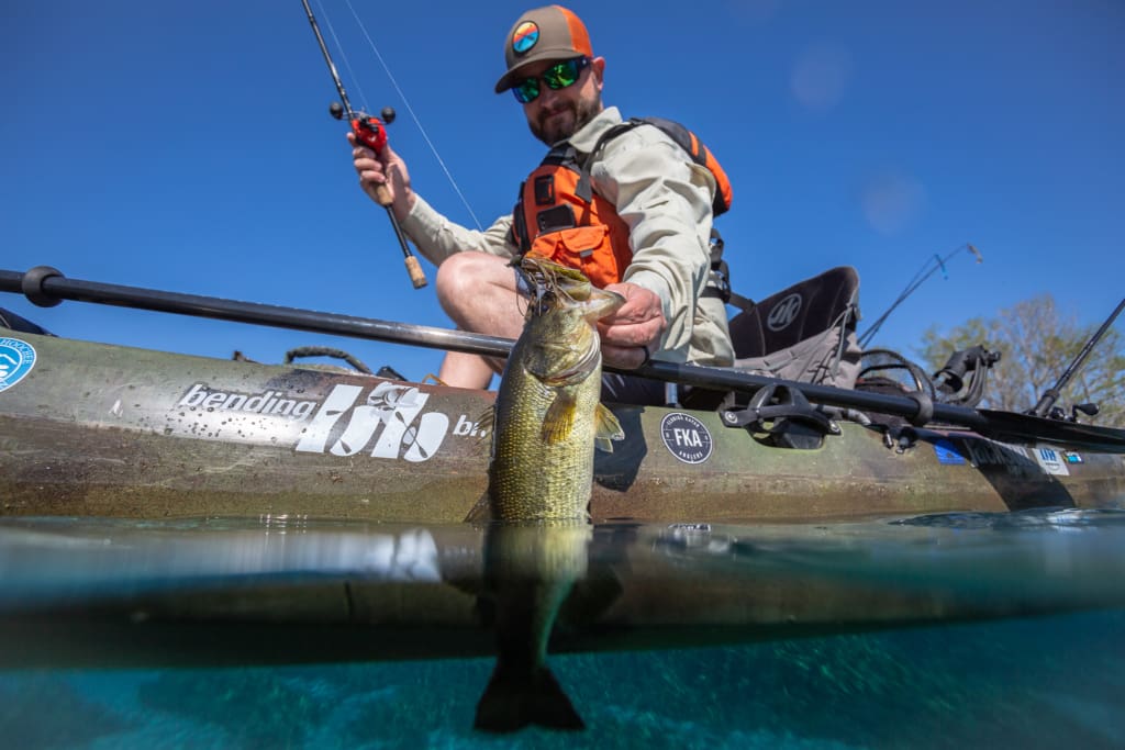 Catch of the day fishing in a kayak on the Merritt's Mill Pond.